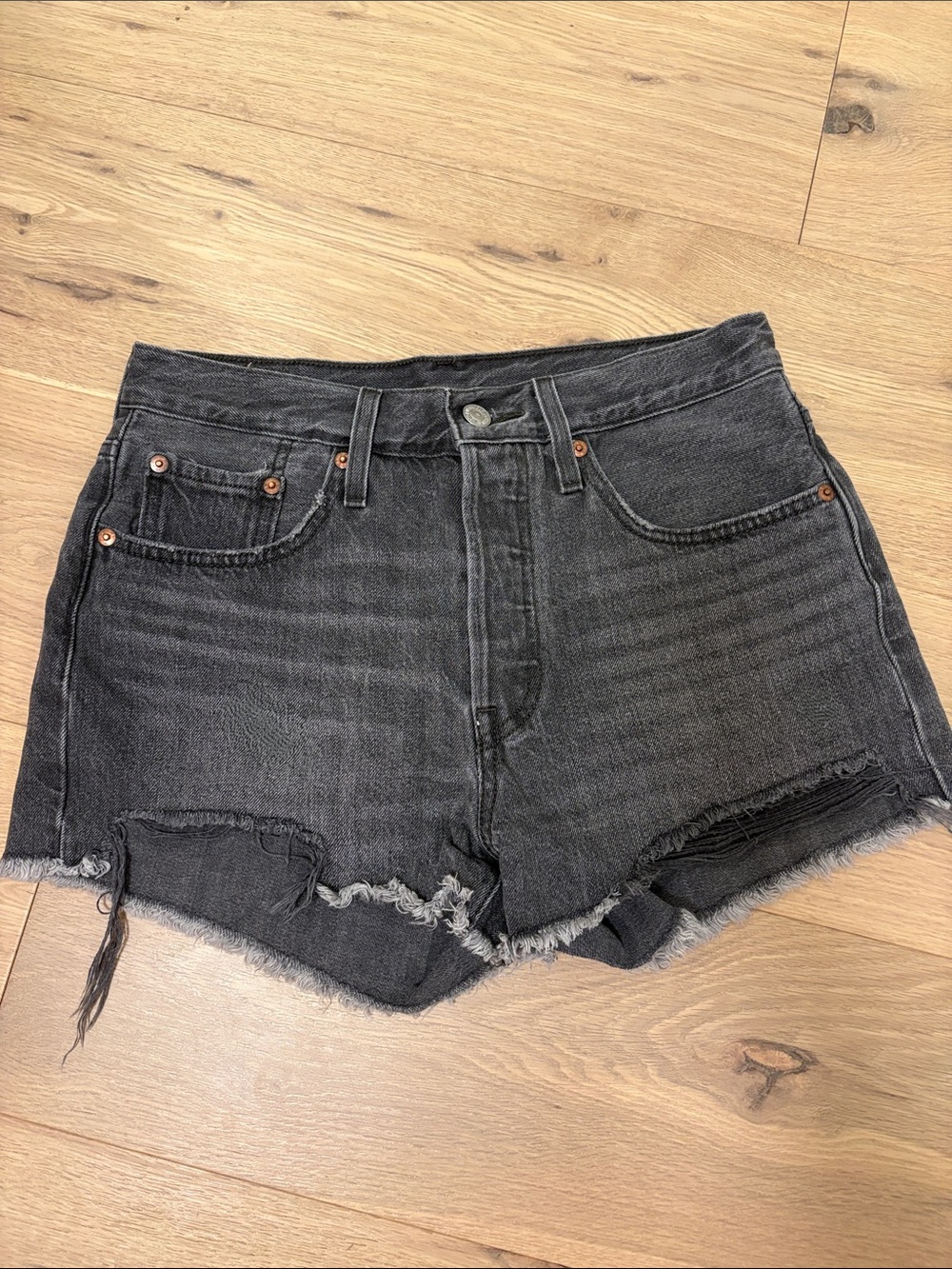 Levi’s High-Waist Distressed Black Denim Shorts